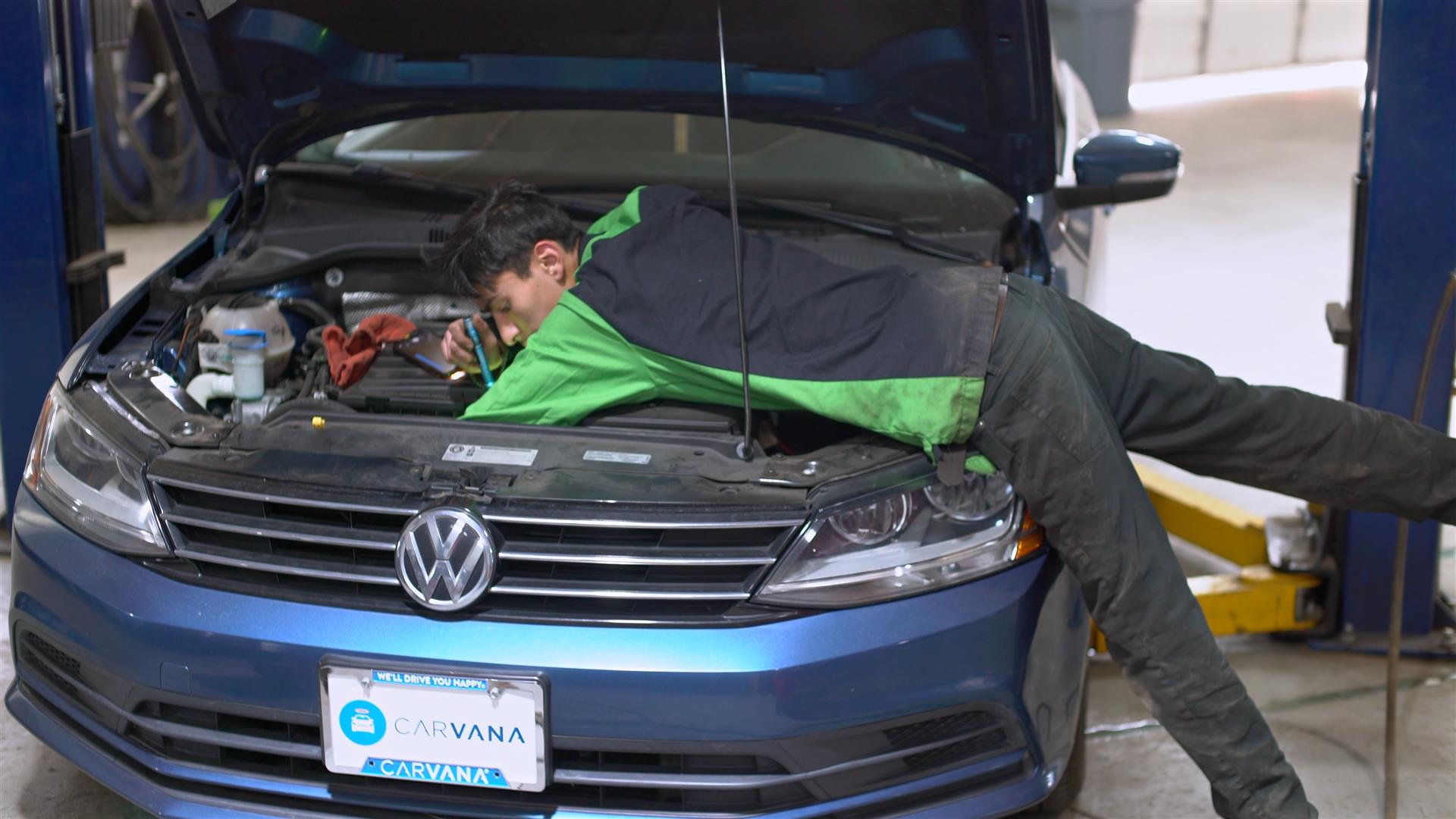 Image of an auto tech performing Albuquerque car repair