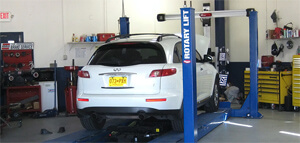 Image of an Infinity SUV being serviced by the best mechanic in Albuquerque Brown's Automotive Experts